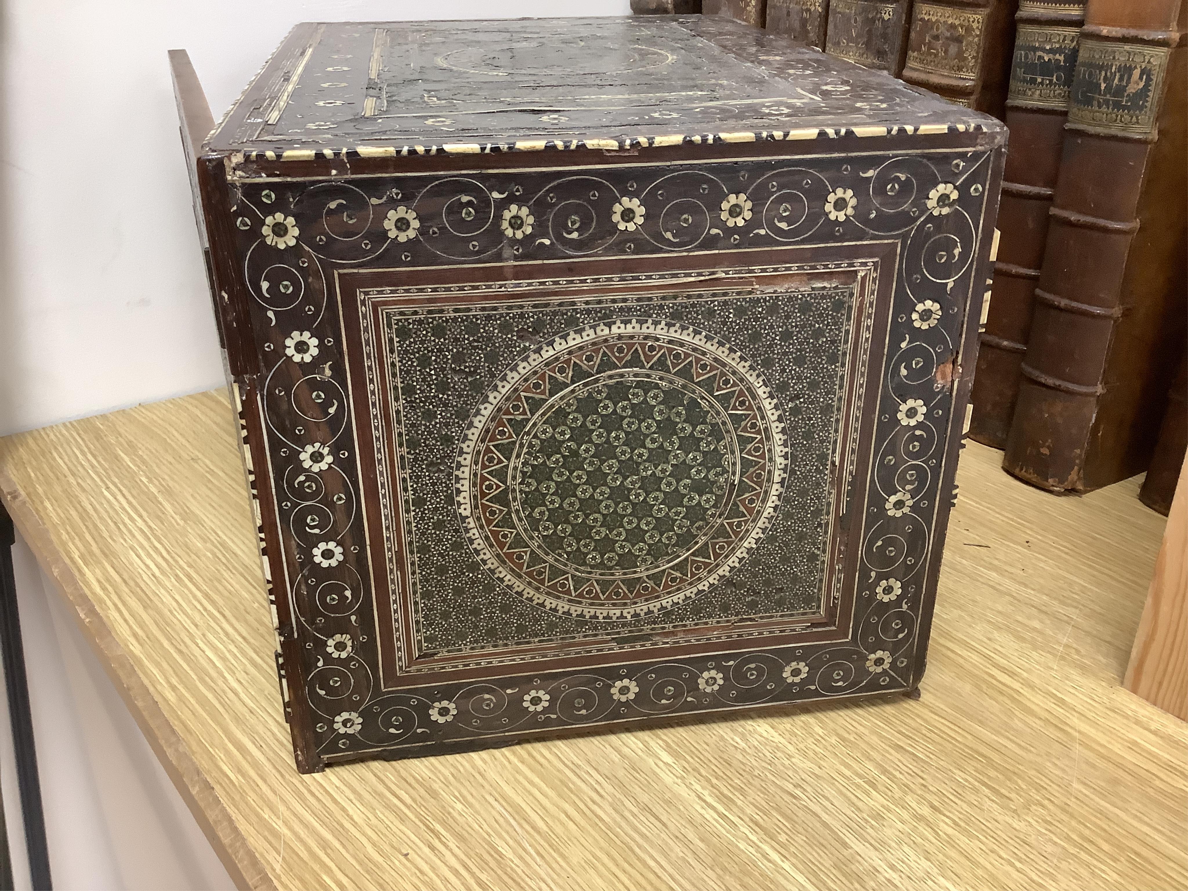 An early 17th century Indo-Portuguese ivory inlaid table cabinet, Gujarat, 29cm high. Condition - poor, losses CITES Submission reference 3XBFQXPT